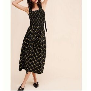 Elegant Black and Gold Midi Dress